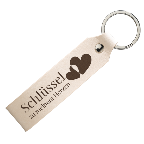 Ein eleganter Leder-Schlüsselanhänger mit Herzmotiv und Gravur „Schlüssel zu meinem Herzen“ – ideal als Geschenkidee.